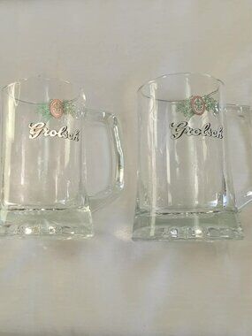 Two vintage Grolsch beer mugs or glasss with the brewery's logo